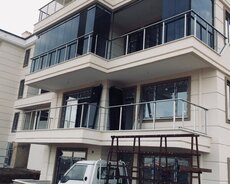 Gözəl görüntüsü ilə insanları valeh edən cam balkon