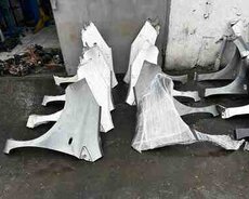 Nissan Note E11 qanadları