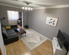 Отремонтированная 4-комнатная квартира в Новом Ясамале