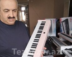 Çəhrayı rəngli qatlanan piano