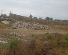 Продается земельный участок по трассе Забрат Курдаханы.