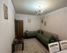 Yeni Günəşli, V Massivində 2 otaqlı əla təmirli mənzil