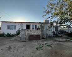 Maştağa Bilgəh yolunda ev satılır