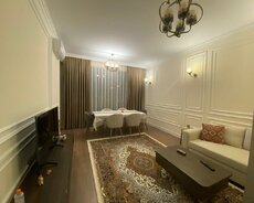 Bakıxanovda 2 otaqlı əla təmirli mənzil